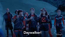 a group of people are walking and the word daywalker is on the bottom right