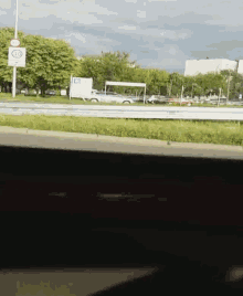 a sign on the side of the road says that the speed limit is 20