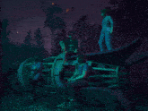 a group of people standing on top of a large object in a dark room