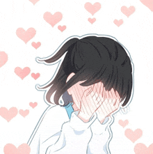 a girl covering her face with her hands with hearts around her