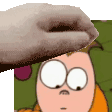 a close up of a person 's head with a cartoon character in the background .