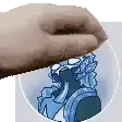 a close up of a person 's hand holding a cartoon character .