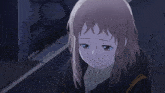 a girl with a sad look on her face is in a dark room