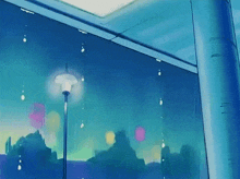 a street light is lit up in front of a window with a blue sky in the background