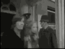 George Harrison Pattie Boyd GIF - George Harrison Pattie Boyd Leaving The Courthouse GIFs