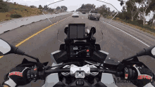 driving motorcyclist magazine riding cruising on the road
