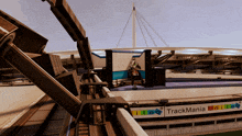 a stadium with a sign that says trackmania united on it