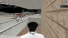 a screenshot of a video game shows a man walking down a set of stairs with a highway 85 sign in the background