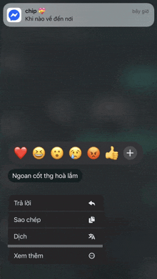 a phone screen shows a message from chip with smiley faces
