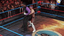 two wrestlers in a ring with one wearing a bandana that says ' smackdown ' on it