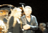 Lindsey Buckingham Stevie Nicks GIF - Lindsey Buckingham Stevie Nicks Whispering GIFs
