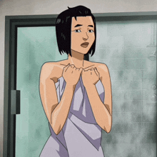 a woman wrapped in a towel is standing in a shower