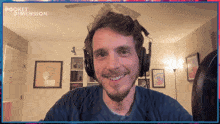 a man wearing headphones is smiling in front of a screen that says pocket dimension on it