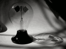 Lightbulb Shadow GIF - Lightbulb Shadow Spin GIFs