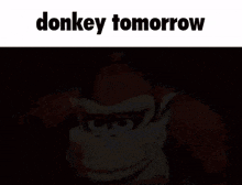 a picture of donkey kong with the words donkey tomorrow above it