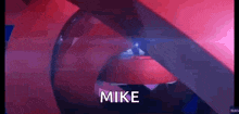 a close up of a person 's mouth with the word mike written in the corner .