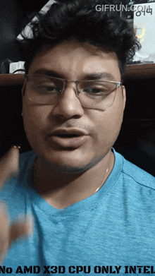 a man wearing glasses and a blue shirt says " no amd x3d cpu only intel " on the bottom