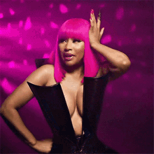 a woman with bright pink hair is wearing a black corset