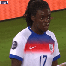 a soccer player wearing the number 17 jersey