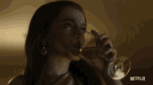 Drinking Anna Delvey GIF - Drinking Anna Delvey Julia Garner GIFs