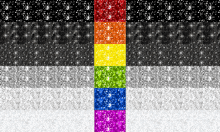 a rainbow of different colors of glitter on a black background