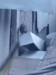 a painting of a room with a few pieces of paper on the ground