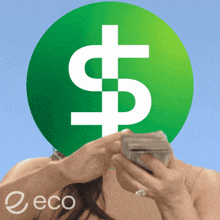 a woman is holding money in front of a dollar sign