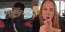 a man and a woman are sitting next to each other and the woman is making a peace sign