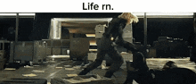 a screenshot of a movie with the words life rn on the bottom