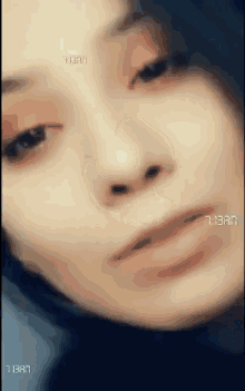 a close up of a woman 's face with the time 1:13am