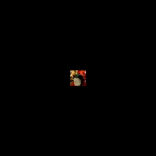 a blurry picture of a man covering his face with his hands