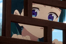 a girl with blue eyes is peeking out of a wooden fence