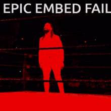 a picture of a wrestling match with the words epic embedded fail on the bottom