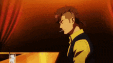 a man with a ponytail is smoking a cigarette