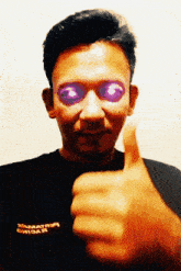 a man giving a thumbs up with purple eyes
