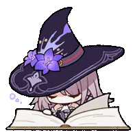a girl wearing a witch hat is sleeping on a book .