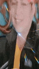 a close up of a person 's face with a jacket that says north face on it