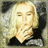a man with long blonde hair is smoking a cigarette with the words i love you written below him