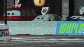 a race track with a blue sign that says world on it