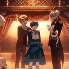 three anime characters are standing next to each other on a stage .