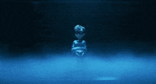a cartoon character stands in a dark room with a blue background