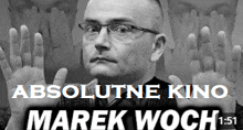a black and white photo of a man with glasses and the words absolutne kino marek woch at the bottom
