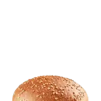 a bun with sesame seeds on it is sitting on a white surface