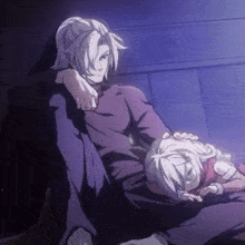 a man and a girl are sitting next to each other and the girl is sleeping on the man 's lap