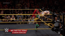 a wrestling match is being shown on a wwe network channel