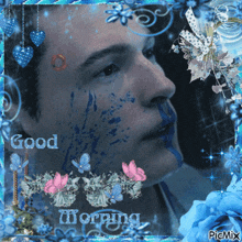 a picture of a man with blue paint on his face with the words good morning