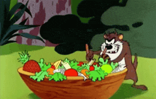 a cartoon of taz eating a salad with a spoon