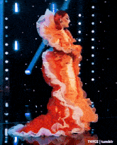 a painting of a woman in a red and white dress with a tumblr link