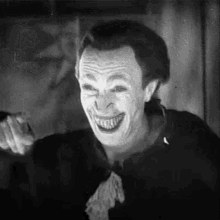 Laughing Man Joker GIF - Laughing Man Joker Evil Clown GIFs