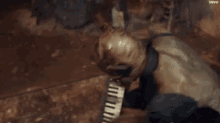 a man is playing an accordion in a dark room with a mask on his face .